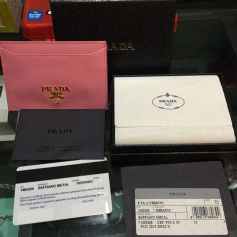 prada card holder gold hardware|Prada credit card holder wallet.